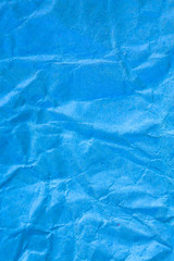 Texture crumpled blue paper background.