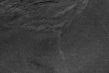 Dark grey black slate background or texture.