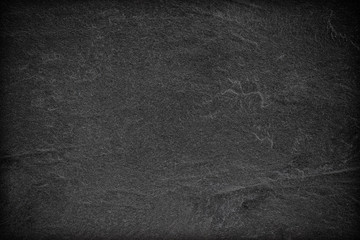 Dark grey black slate background or texture.