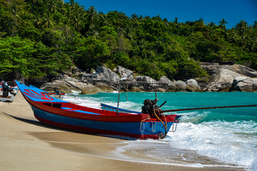 Longboats on the Coast of Ko Phagnan Island in Thailand