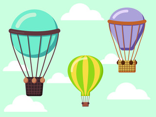 Multicolored balloons flying in the clouds.