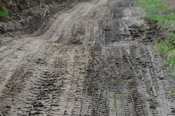 tyre prints in muddy soil macro