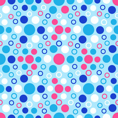 Seamless abstract geometric pattern with the image of multicolored circles.