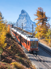 A tourism train with Matterhorn mountain in Zermatt Switzerland