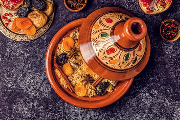 Traditional moroccan tajine of chicken with dried fruits and spices.