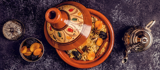 Traditional moroccan tajine of chicken with dried fruits and spices.