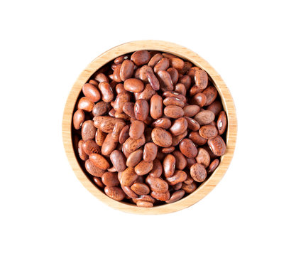 Pinto bean in a bowl isolated on white background, top view