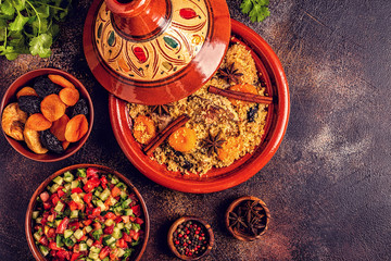 Traditional moroccan tajine of chicken with dried fruits and spices.