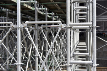 Building construction site, solidly assembled scaffolding