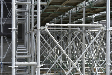 Building construction site, solidly assembled scaffolding