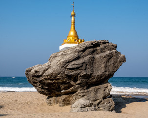 Buddhist stupa at Ngwe Saung Beach on the Bay of Bengal in Myanmar