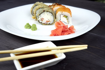 Sushi rolls on a white plate