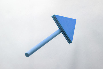 BLUE wooden arrow pointing upwards.