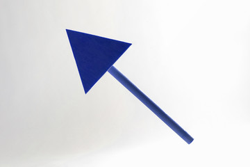BLUE wooden arrow pointing upwards.
