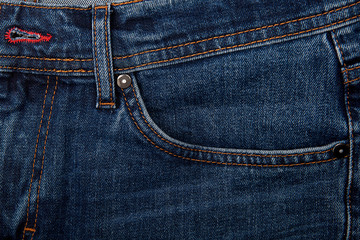 Fototapeta premium Fashionable clothes. Jeans on a background.