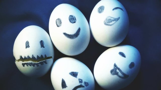 Pile of eggs with different emotions, variety, individuality