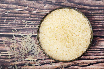 A glass bowl with white long-grain rice