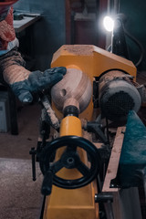 Carpenter working for the machine 