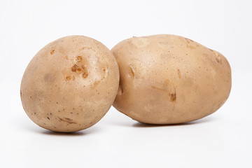  Potatoes on the white background.