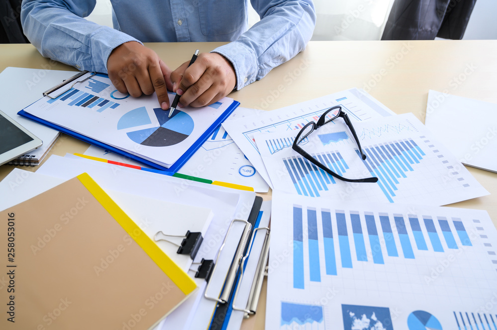 Poster business documents on office graph financial with social network diagram discussing data analysis da
