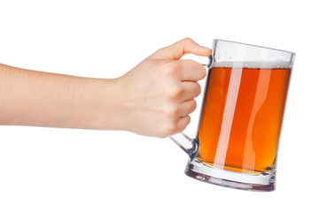 Hand with full beer glass isolated on white background