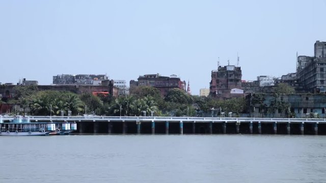 A bard fly over Ganga river, babu ghat. a panning shoot.