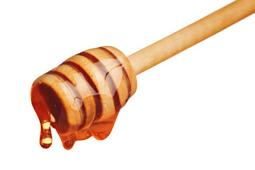 honey and honey comb with wooden stick