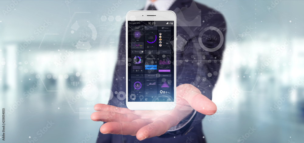 Poster businessman holding smartphone with user interface data on the screen isolated on a background