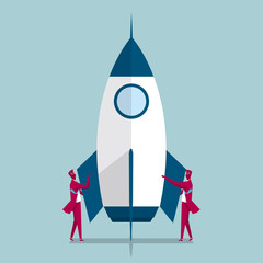 Aerospace industry. Two businessmen are standing on both sides of the rocket. Isolated on blue background.