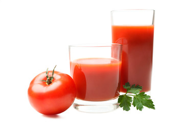 Glass of fresh tomato juice and  tomatoes