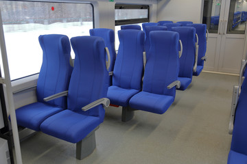 Comfortable soft seats in a high-speed express train car