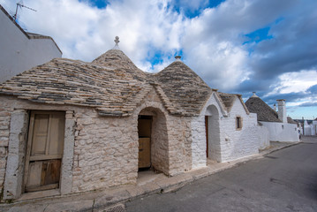 View of Alberobello's famous Trulli, the characteristic cone-roofed white houses of the Itria...