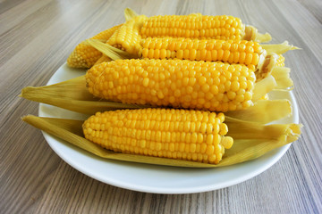 Boiled corns on wood table
