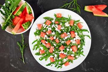 Fresh summer watermelon salad with feta cheese and arugula