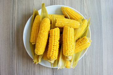 Boiled corns on wood table