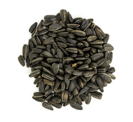 dry sunflower seeds on a white background 