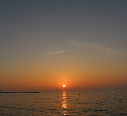 Scenic sunset and natural dramatic cloudy sky and sunbeam view over Dubai, United Arab Emirates