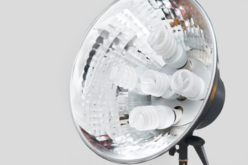 Professional photo equipment store. The powerful lamp of permanent studio light with round...