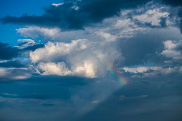 Obraz premium Rainbow at blue sky clouds nature art 