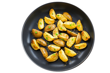Fresh crispy potato wedges in  a bowl isolated  on white background, vegetarian healthy food, top view above angle