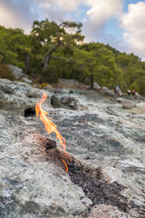 Flames of Chimera Mount from the underground in Cirali, Turkey