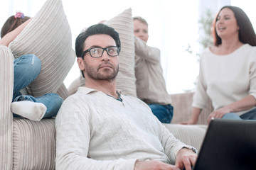 Fototapeta premium modern family in the living room in the evening.