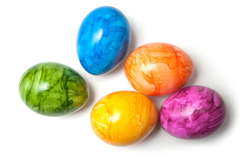 closeup of decorative painted easter eggs on white background