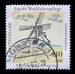 Stamp printed in Germany shows Welfare: Water and Windmills, circa 1997.