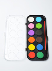 Watercolor paints box on white background