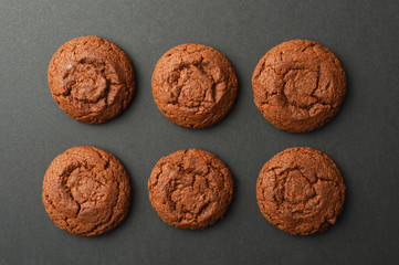 Chocolate cookies on black background