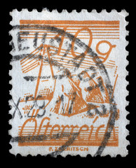 Stamp printed in Austria shows Stooks and telegraph wires, circa 1925.