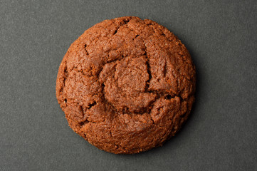 Chocolate cookie on black background