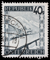 Stamp printed in Austria shows Mariazell, Styria from the series Landscapes, circa 1945.