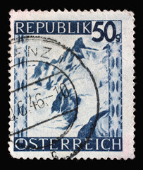 Naklejka premium Stamp printed in Austria shows Silvretta Mountains, Vorarlberg, series, circa 1945.